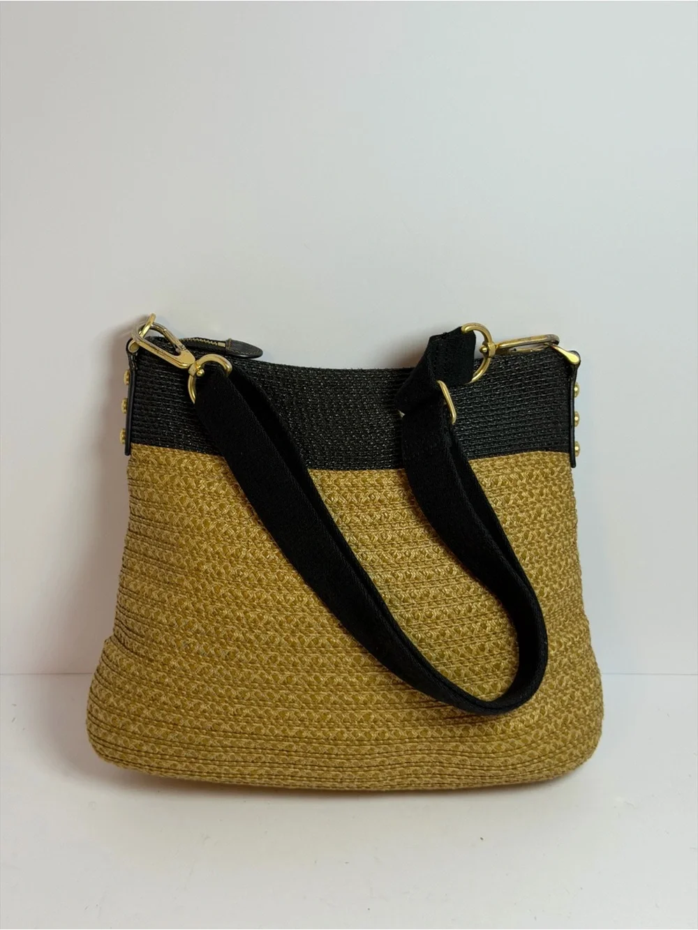 Eric Javits Woven Escape Shoulder bag in a Black and Natural Straw Colorway